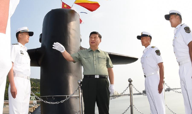 Xi stresses building elite maritime force during navy inspection