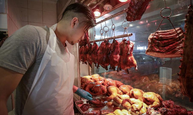 Feature: Young barbecue master carries on Chinese family business in Vancouver