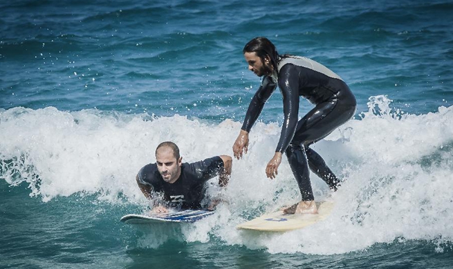 Greek surfers take on waves on Evia island