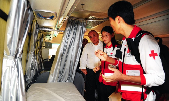 China's Red Cross donates mobile clinics, ambulances to Syria