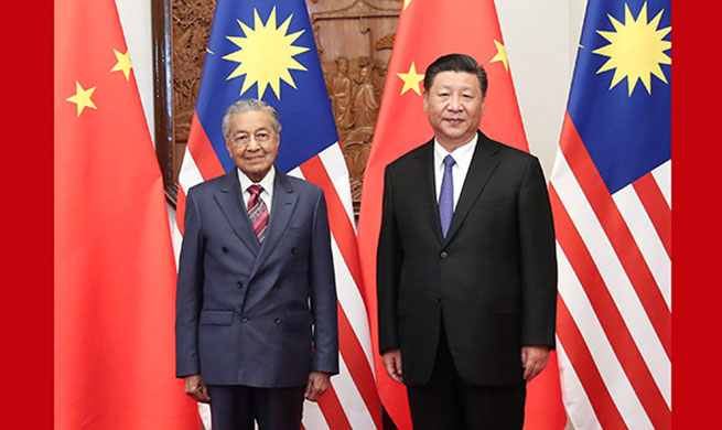 Xi meets Malaysian PM Mahathir