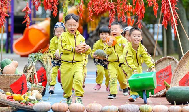 Event to experience farmwork for children held E China's Zhejiang