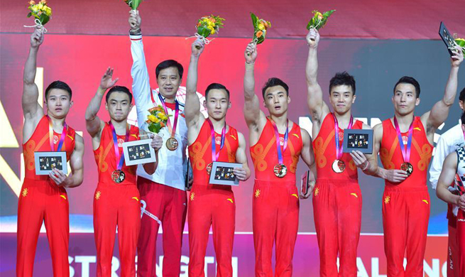 China wins men's team title at gymnastics worlds