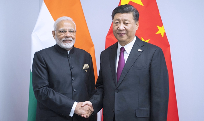China, India agree to bring ties to higher level