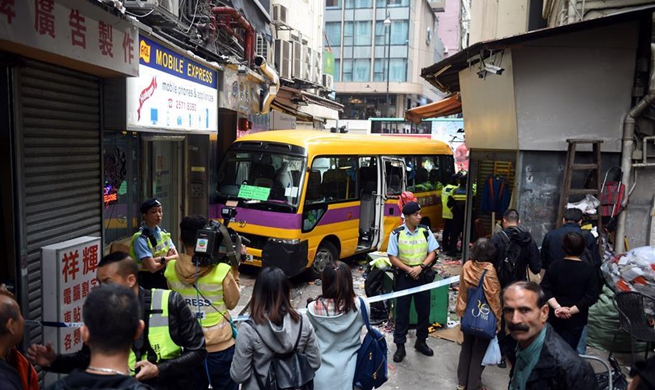 2 dead, 12 injured in Hong Kong school minibus crash