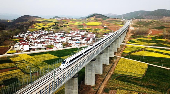 China to better balance environment protection, economic development