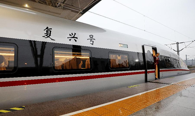Longer Fuxing bullet train starts operation