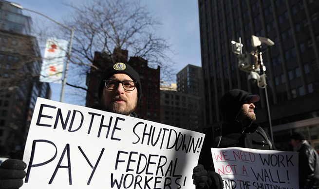 Federal employees rally against government shutdown in New York