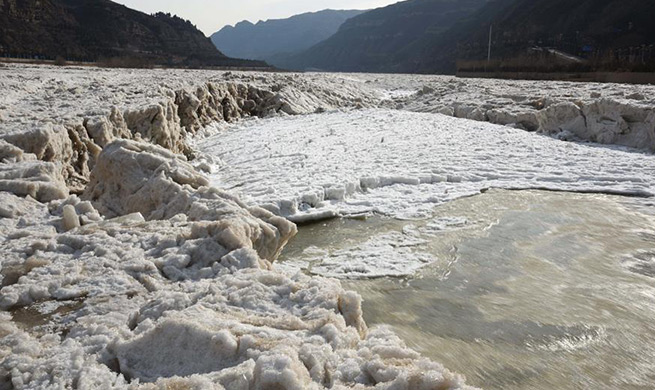 In pics: frozen Hukou Waterfall on Yellow River