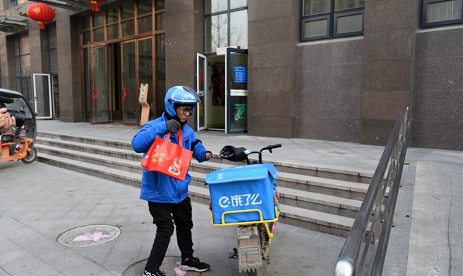 Pic story: disabled deliveryman's Spring Festival wish