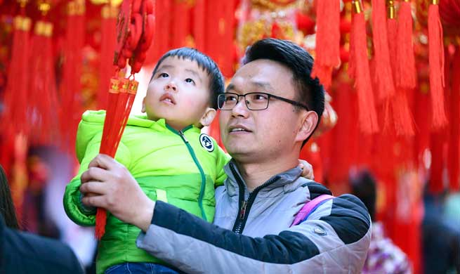Red decorations arranged across China to greet upcoming lunar New Year
