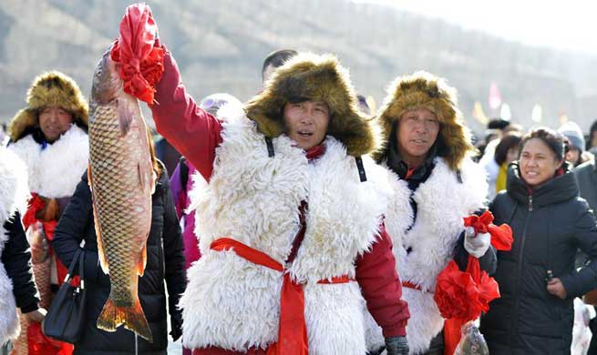 Winter fishing tourism festival held in Hohhot, north China's Inner Mongolia