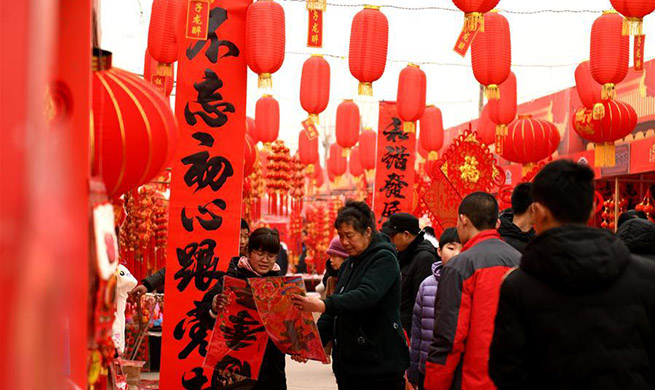 People across China busy preparing for upcoming Lunar New Year