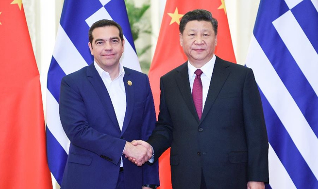 Xi meets Greek prime minister