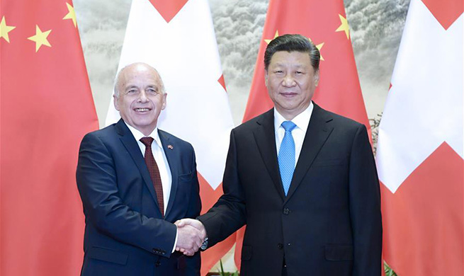 Xi holds talks with Swiss Confederation president