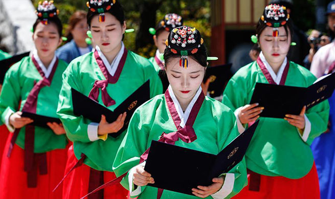 Students wearing traditional Korean costumes attend coming-of-age ceremony in Seoul