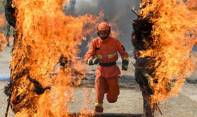 Newly-recruited firemen receive training in Hohhot, north China