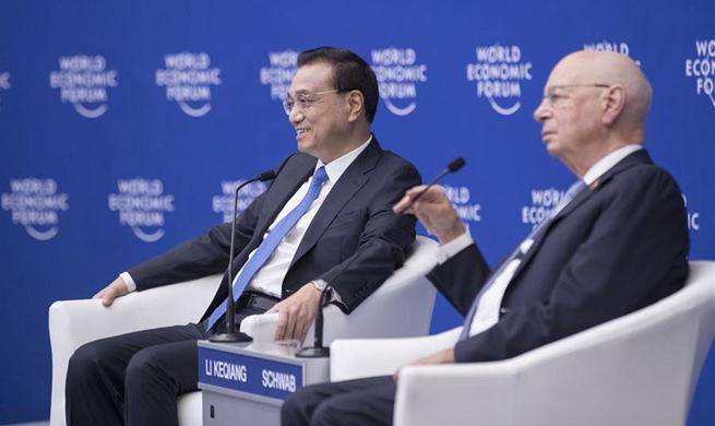 China to further improve business environment, open up wider