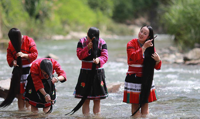 Women of Yao ethnic group have tradition of keeping long hair