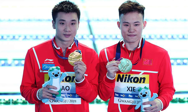 Chinese pair wins men's 3m synchro springboard at FINA World Championships