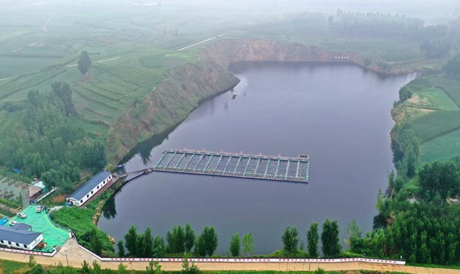 Abandoned mine transformed into fishpond in north China's Hebei