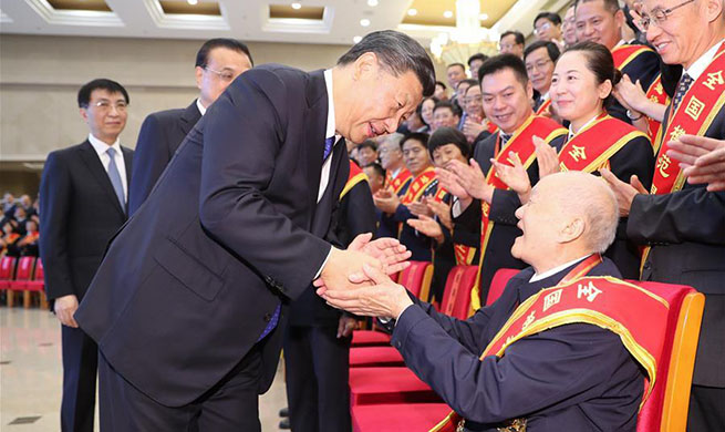 Xi calls for new advances in veterans affairs