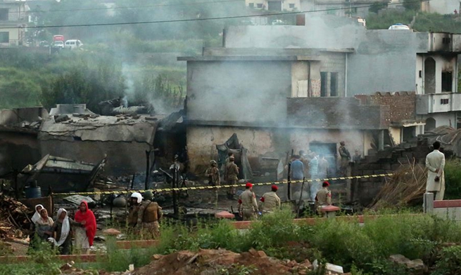 Plane crash at residential area kills 12 in Pakistan's Rawalpindi district