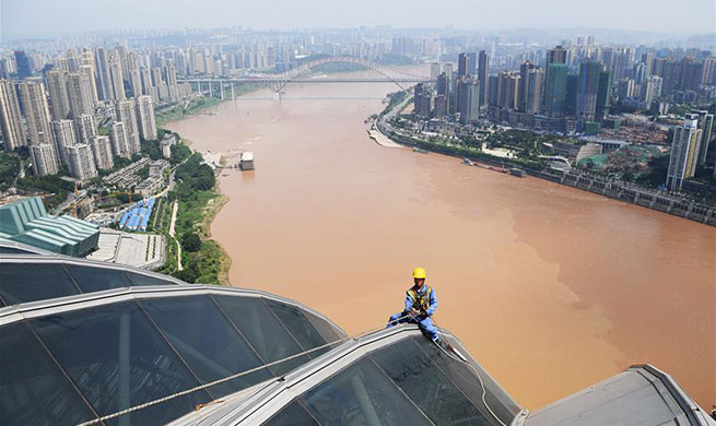 People work in heatwave in China's Chongqing
