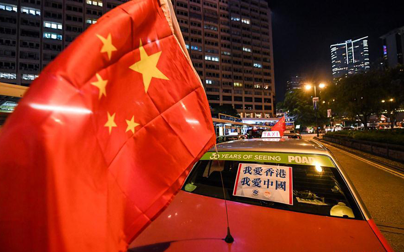 Taxis rally in Hong Kong calls for peace, restoring order