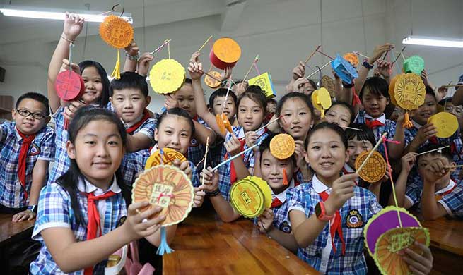 Students celebrate Mid-Autumn Festival in Shijiazhuang, China's Hebei