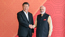 Commentary: Xi-Modi meeting charts course of steady China-India ties