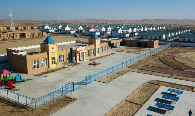 Poverty-stricken households move into new settlement in China's Xinjiang