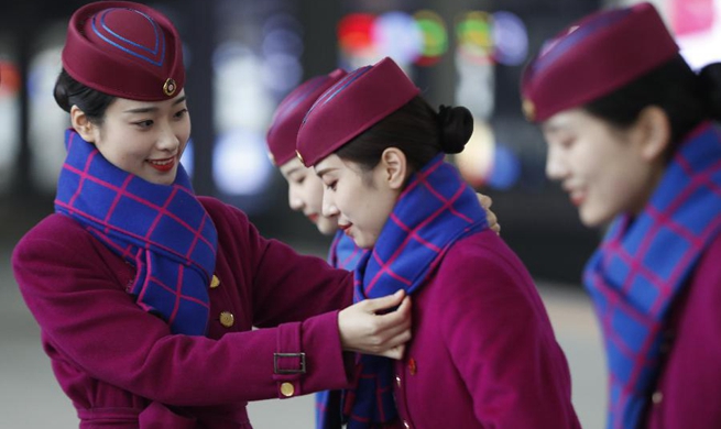 Stewardesses ready for upcoming Spring Festival travel rush in Chongqing