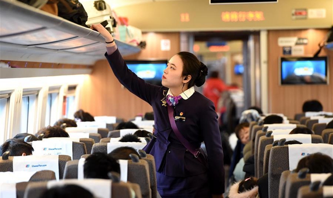 Young train crew employees make debut during Spring Festival travel rush