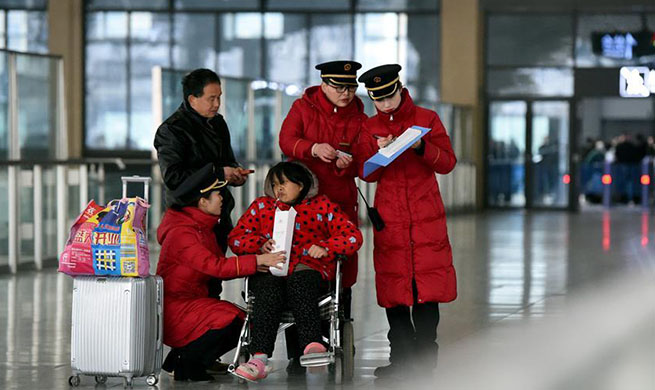 Pic story: passenger service assistants of Bengbu Railway Station in E China