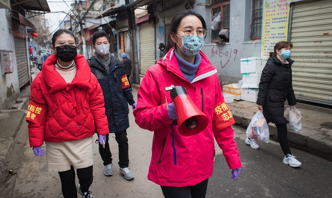 Xinhua Headlines: Wuhan combs communities to leave no coronavirus patient unattended
