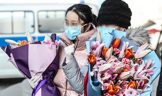 Cured patients discharged from hospital in Shenyang, NE China's Liaoning