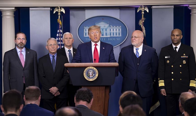 U.S. announces new travel restrictions, warnings over coronavirus concerns