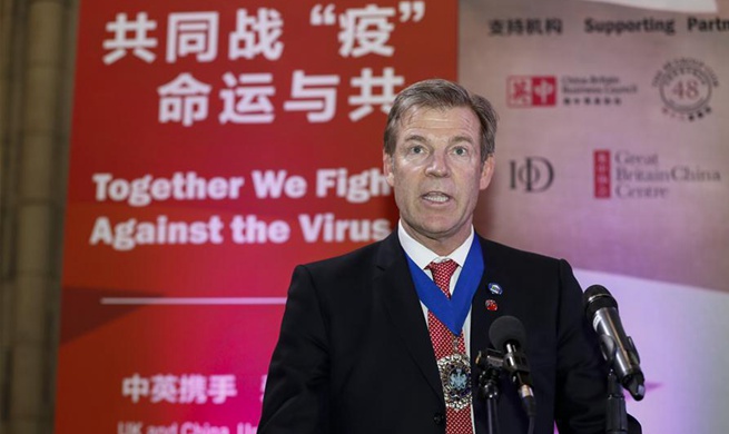 Feature: "Together We Fight against Virus" -- UK business sector voices support for China