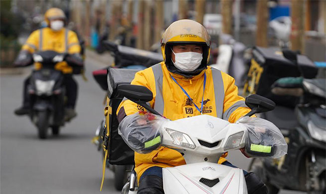 Deliveryman follows strict prevention measures to ensure safety of takeaways