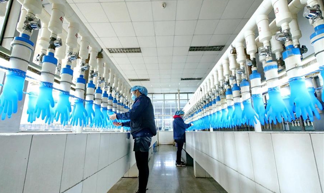 Enterprises producing personal protective equipment resume production orderly in Hebei