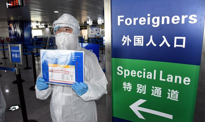 Xinhua Headlines: China guards against imported cases as overseas COVID-19 infections soar