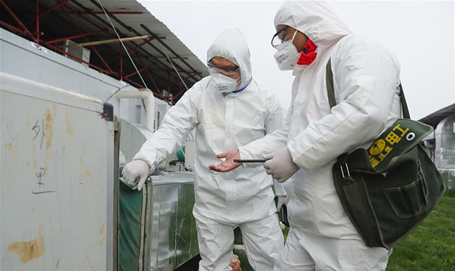 Workers patrol to check operation of hospital in Wuhan
