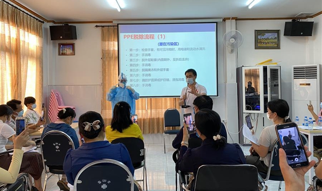 Chinese experts cooperate with Laos' local gov'ts in fighting COVID-19