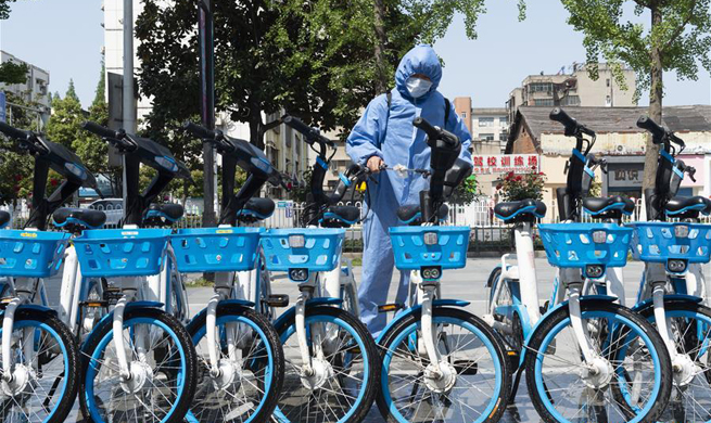 Bicycle-sharing companies restart businesses in Hubei