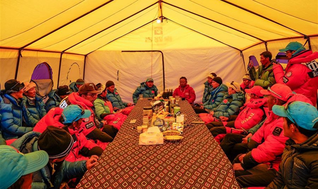 Remeasuring team announces list of 12 people to climb to peak of Mount Qomolangma