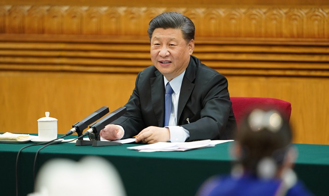 Xi stresses "people first" on first day of annual legislative session
