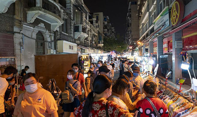 People visit night market in Wuhan