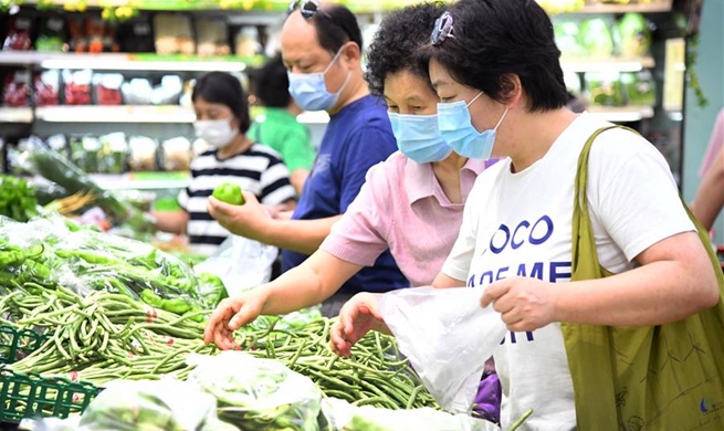 Supermarket chain ensures adequate supply of farm produce after suspension of Xinfadi wholesale market in Beijing