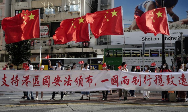 Hong Kong citizens celebrate passage of law on safeguarding national security in HK